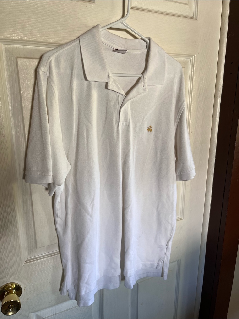 Brooks Brothers White Polo with Subtle Gold Crest